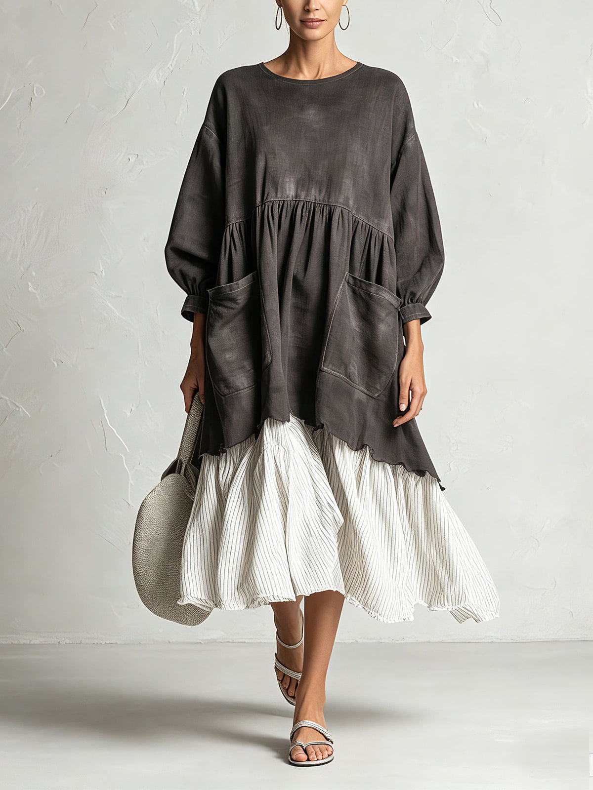 Oversized charcoal midi dress with pleated ivory hem