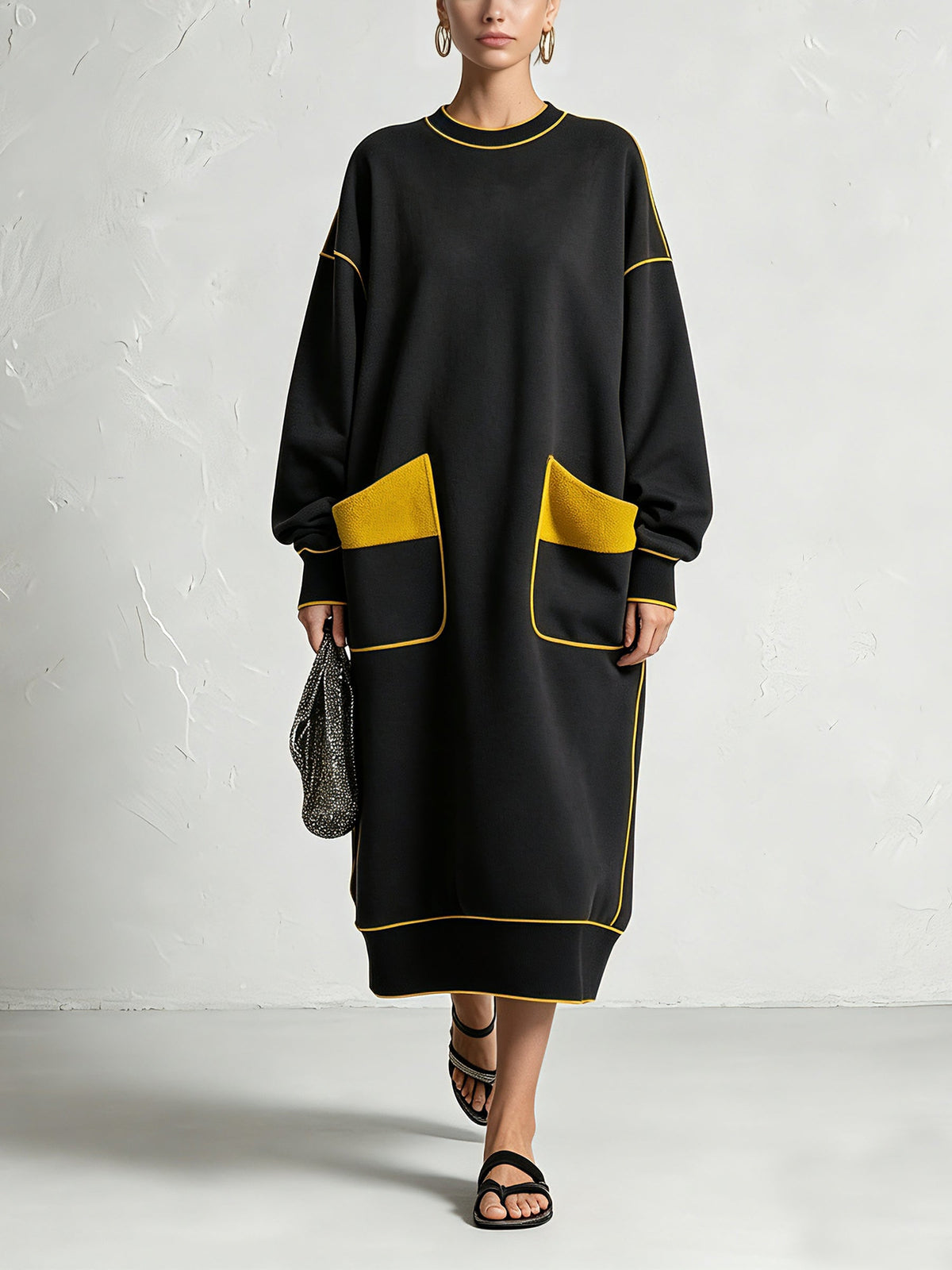 Oversized black midi dress with yellow contrast piping